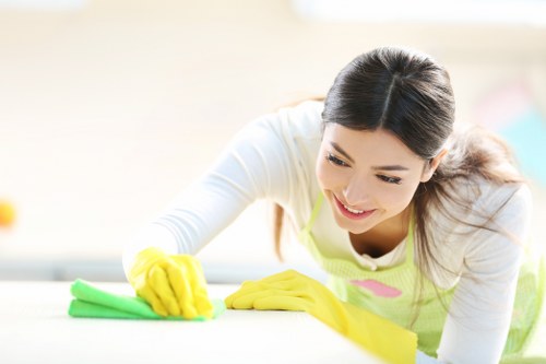 Professional curtain cleaning service handling delicate fabric curtains