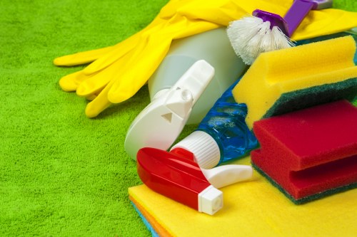 Vacuuming dust and debris from couch upholstery